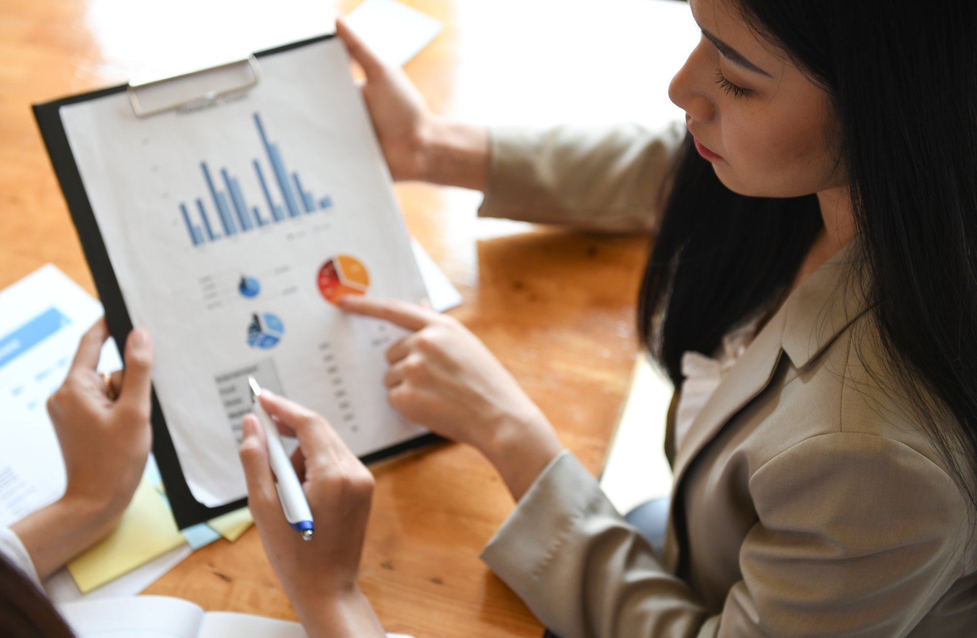 business-women-discussing-data-during-meeting-2026-09-21-13-35-24-utc